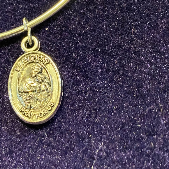 5/$50 Adjustable Silver Bracelet
With a silver double sided Medallion - Picture 10 of 10